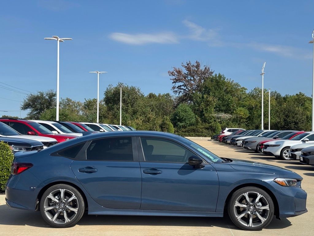 2026 Honda Civic Hybrid Sport Touring Blue at Community Honda