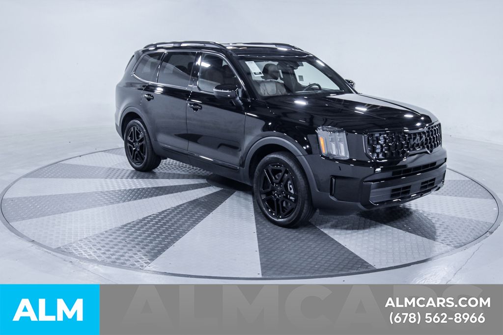 Used 2025 Black Kia EX X-Line image 14