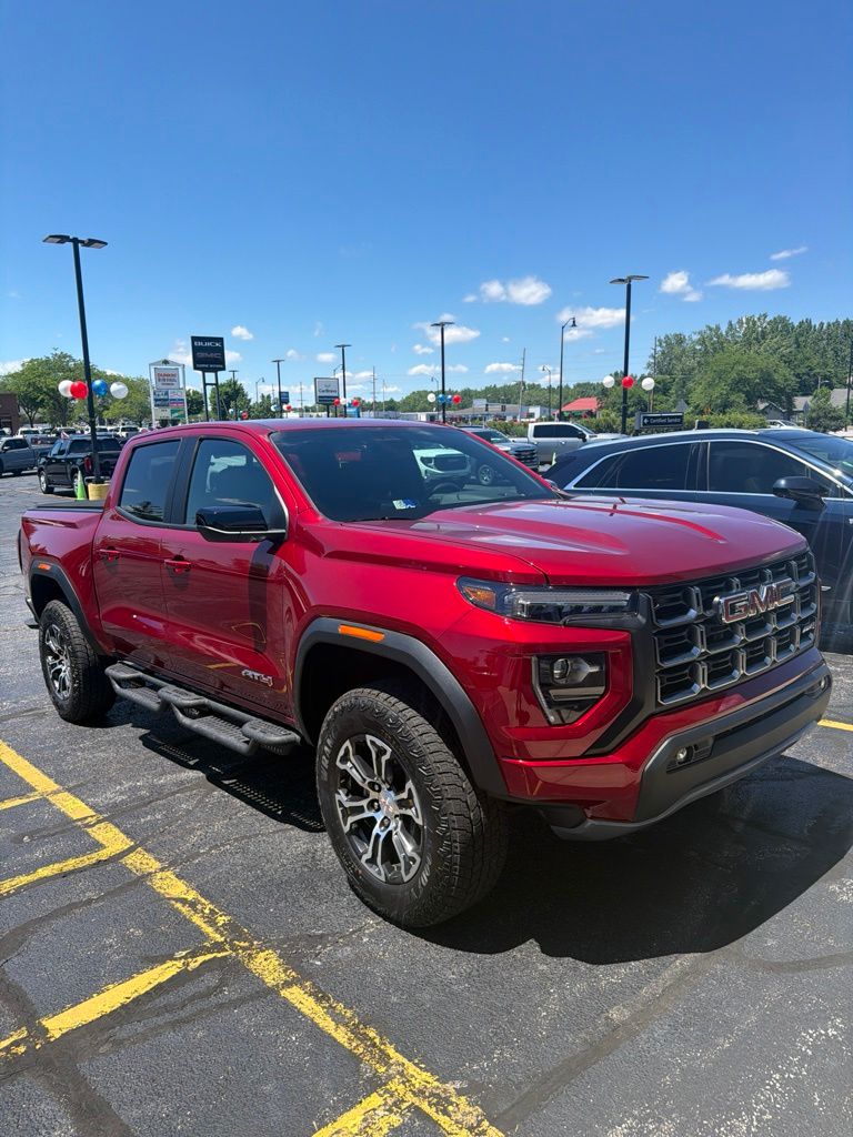 Volcanic Red Tintcoat 2025 GMC Canyon AT4 Crew Cab 4WD Pickup Truck Four-Wheel Drive 8-Speed Automatic
