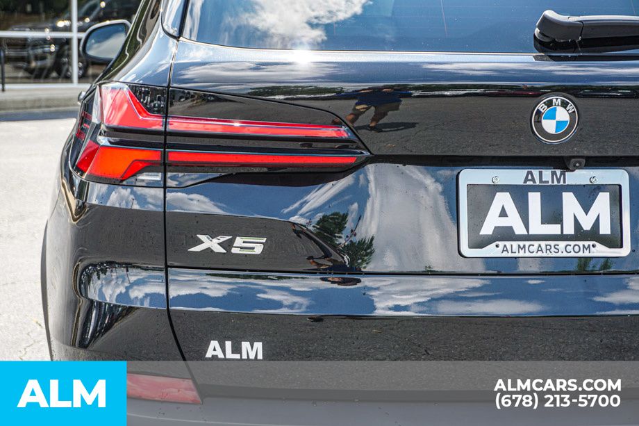 Used 2026 Black BMW sDrive40i image 14