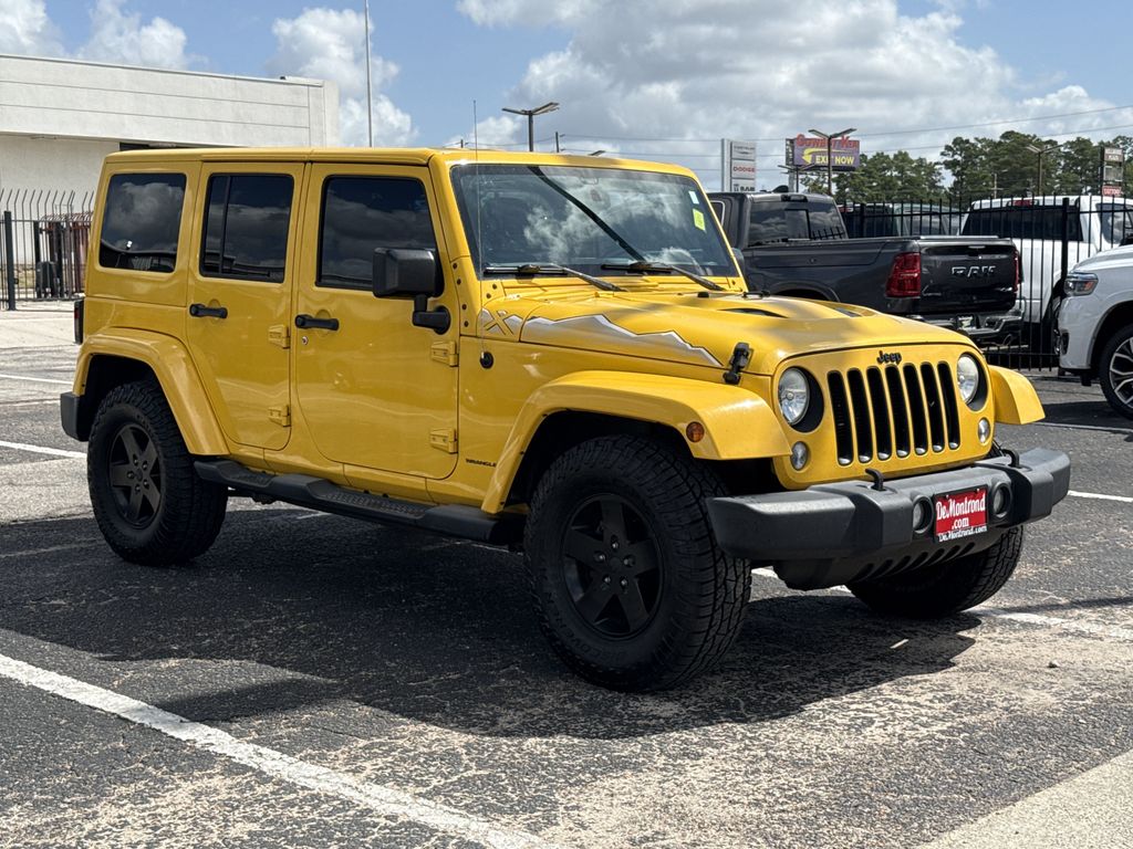 2015 Jeep Wrangler Unlimited Sahara Yellow at Parkway Family Mazda