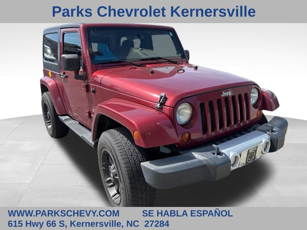 Deep Cherry Red Crystal 2012 Jeep Wrangler Sahara 4WD SUV / Crossover Four-Wheel Drive 6-Speed Manual