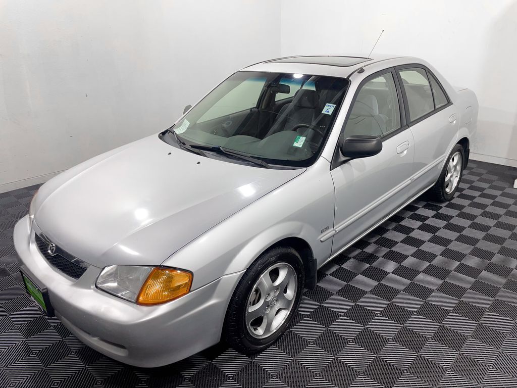 Silver 2000 Mazda Protege Sedan Front-Wheel Drive 5-Speed Manual
