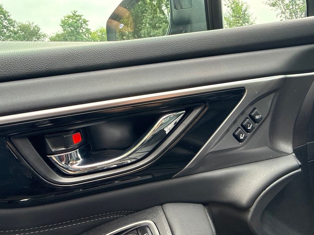 2025 Subaru Outback Touring Red at Rafferty Subaru