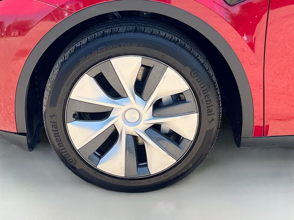 2024 Tesla Model Y Long Range Red at Ultimate Motorsports