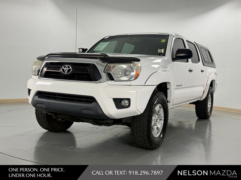 Super White 2015 Toyota Tacoma Pickup Truck Four-Wheel Drive 6-Speed Manual