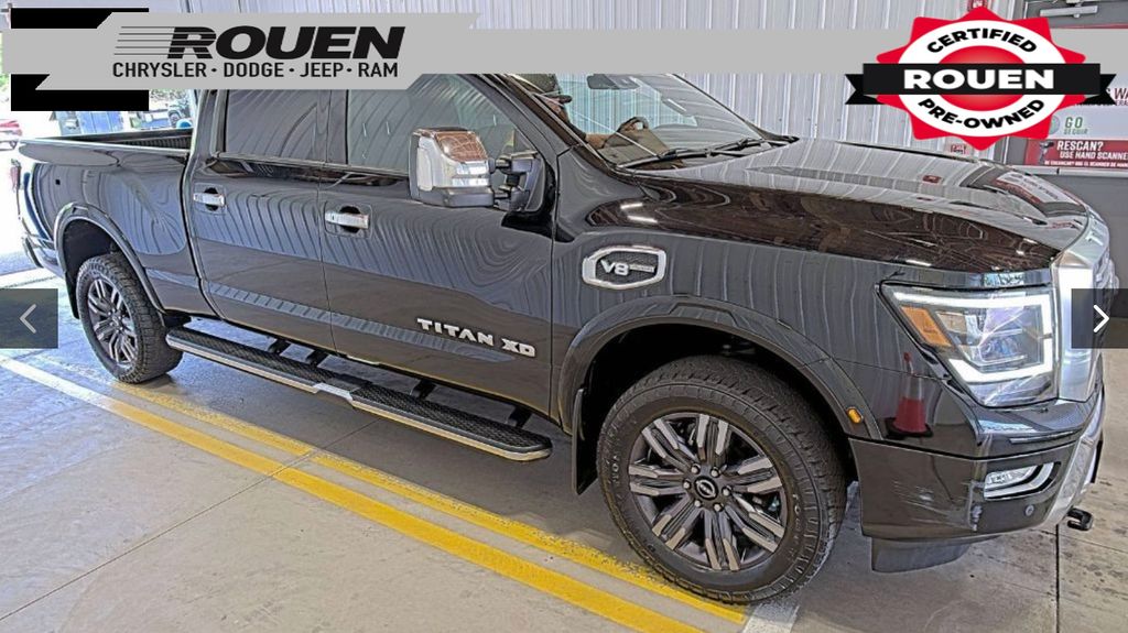 Super Black 2023 Nissan Titan Pickup Truck Four-Wheel Drive