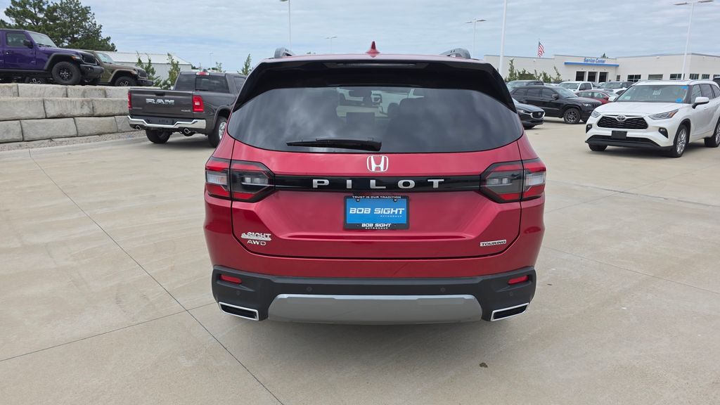 View vehicle photo 4