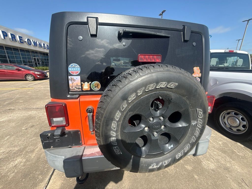 2015 Jeep Wrangler Unlimited Sahara Orange at Emmons Autoplex