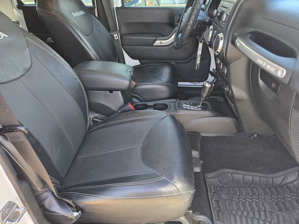 2015 Jeep Wrangler Unlimited Sahara White at DeMontrond Automotive Group