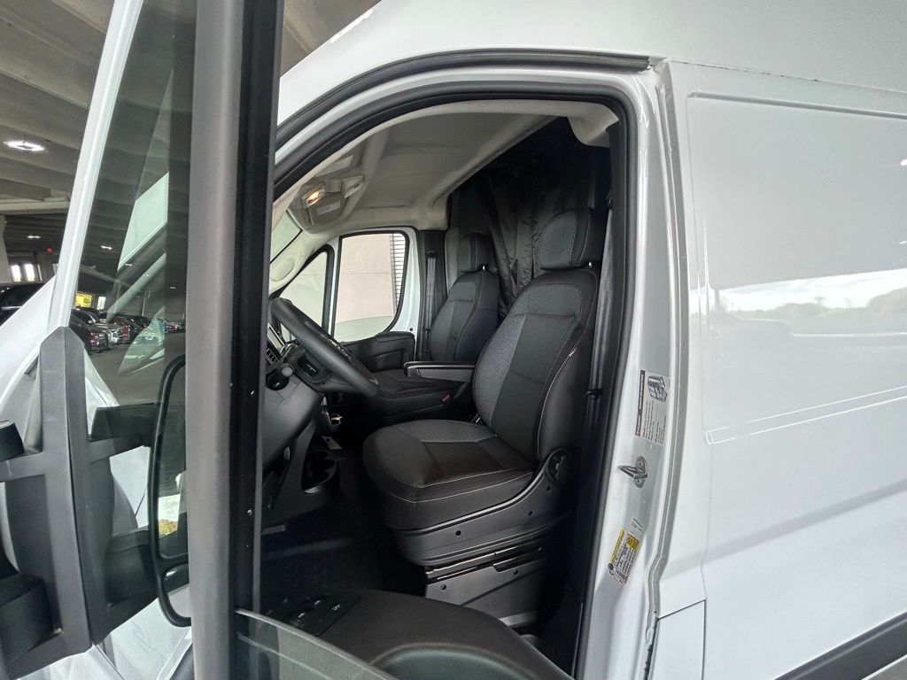 Used 2025 Bright White Clearcoat Ram High Roof image 15