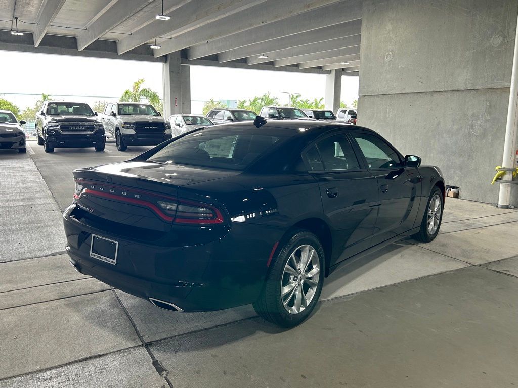 Certified 2023 Dodge Charger SXT with VIN 2C3CDXJG6PH661614 for sale in Miami, FL