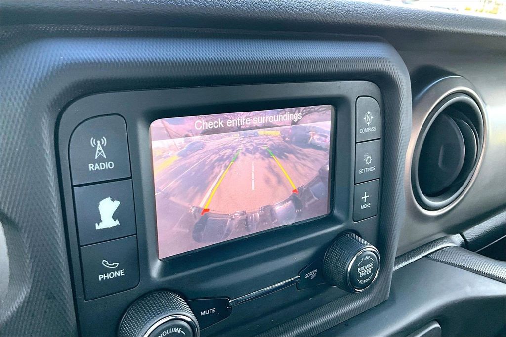 Used 2020 Teal Jeep Unlimited Sport image 23