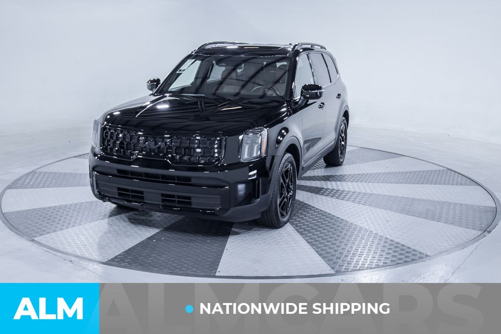 Used 2025 Black Kia EX X-Line image 2