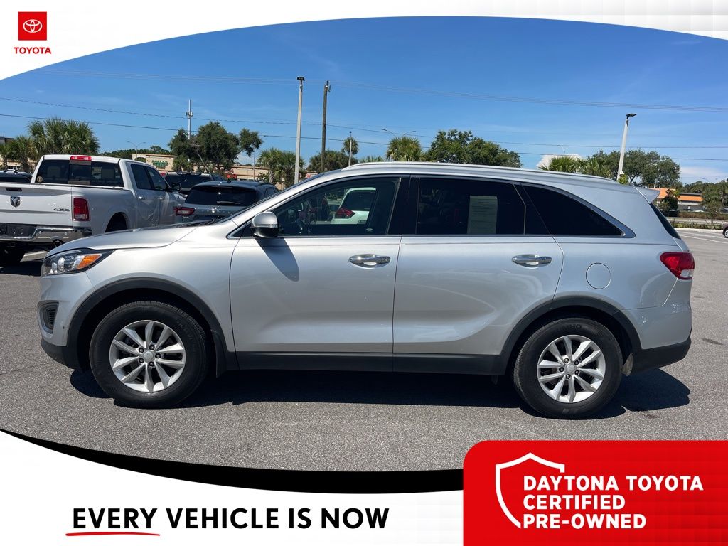 Used 2016 Kia Sorento LX with VIN 5XYPG4A38GG094921 for sale in Daytona Beach, FL