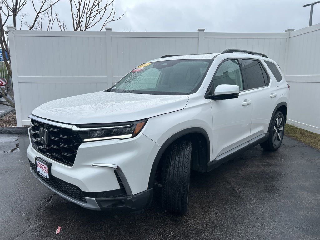 View vehicle photo 3