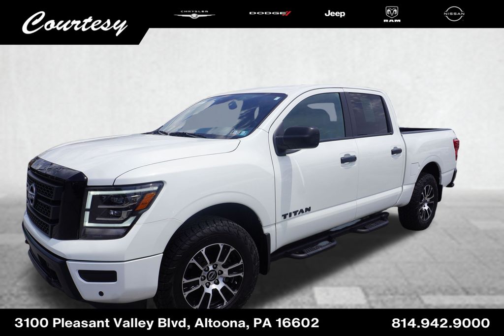 Pearl White Metallic 2024 Nissan Titan Pickup Truck Four-Wheel Drive 9-Speed Automatic