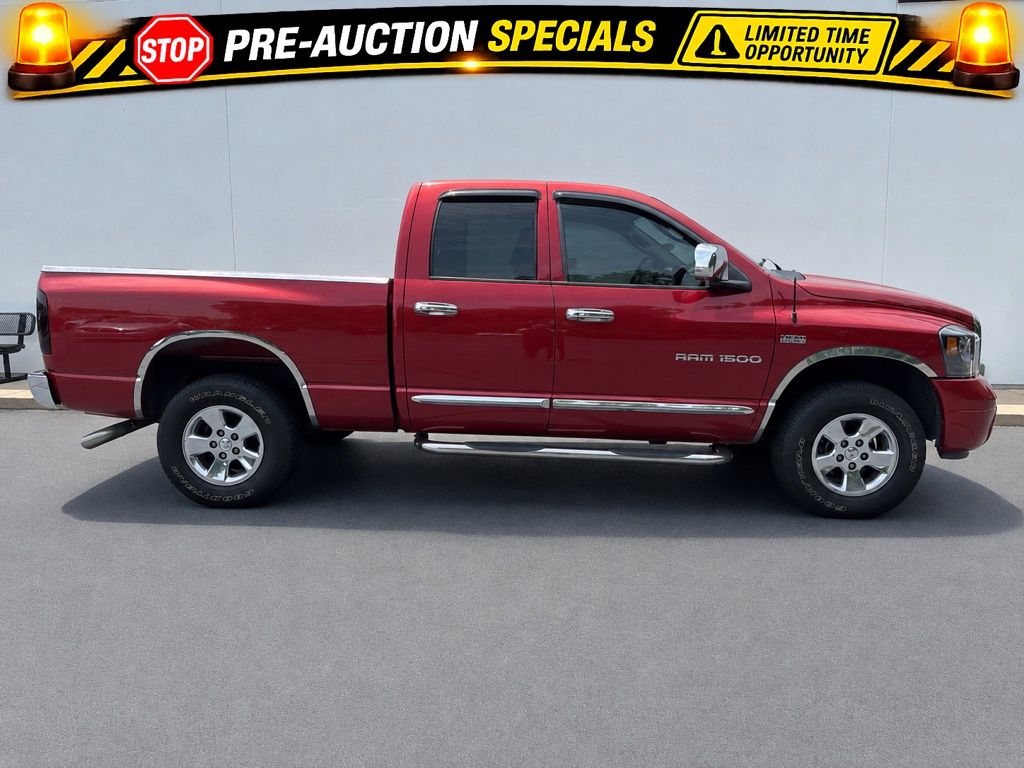Red 2006 Dodge RAM 1500 Laramie Quad Cab 4WD Pickup Truck Four-Wheel Drive 5-Speed Automatic