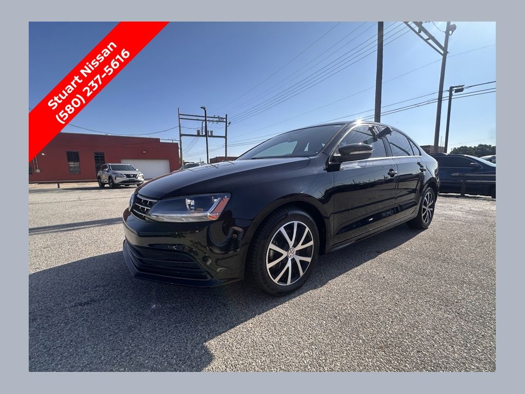 Black Uni 2018 Volkswagen Jetta Sedan Front-Wheel Drive 5-Speed Manual