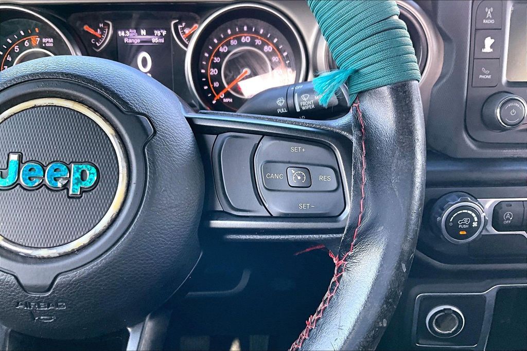 Used 2020 Teal Jeep Unlimited Sport image 21