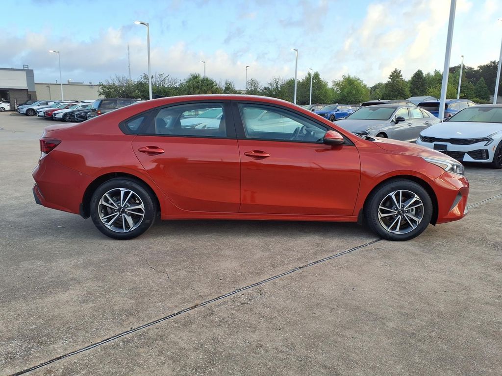 2023 Kia Forte LXS Red at Shottenkirk Kia Fort Bend