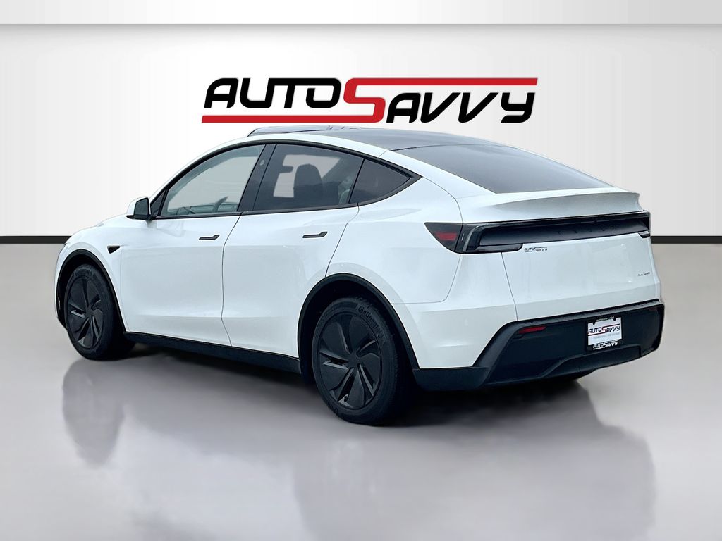 2026 Tesla Model Y Long Range White at AutoSavvy Houston Northwest