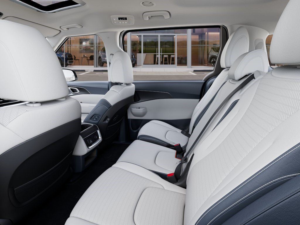2027 Kia Carnival Hybrid SX PRESTIGE AUTO White at Shottenkirk Kia Fort Bend