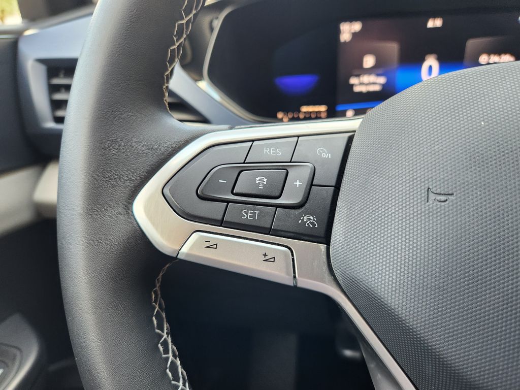 2022 Volkswagen Taos 1.5T SE Red at DeMontrond Mazda