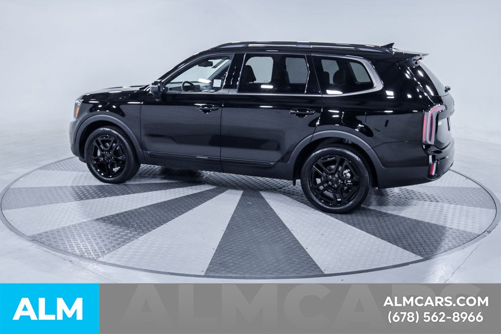 Used 2025 Black Kia EX X-Line image 5