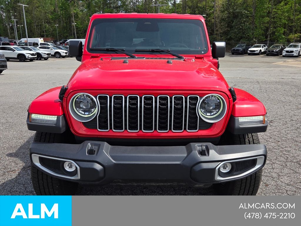 Used 2025 Red Jeep Sahara 4xe image 2
