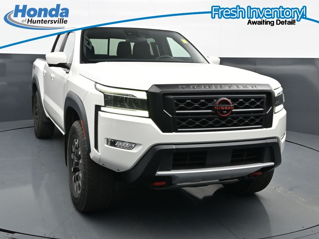 Glacier White 2023 Nissan Frontier Pickup Truck Four-Wheel Drive 9-Speed Automatic