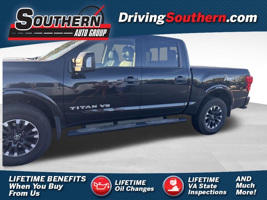 Gray (Magnetic Black) 2018 Nissan Titan Pickup Truck Four-Wheel Drive 7-Speed Automatic