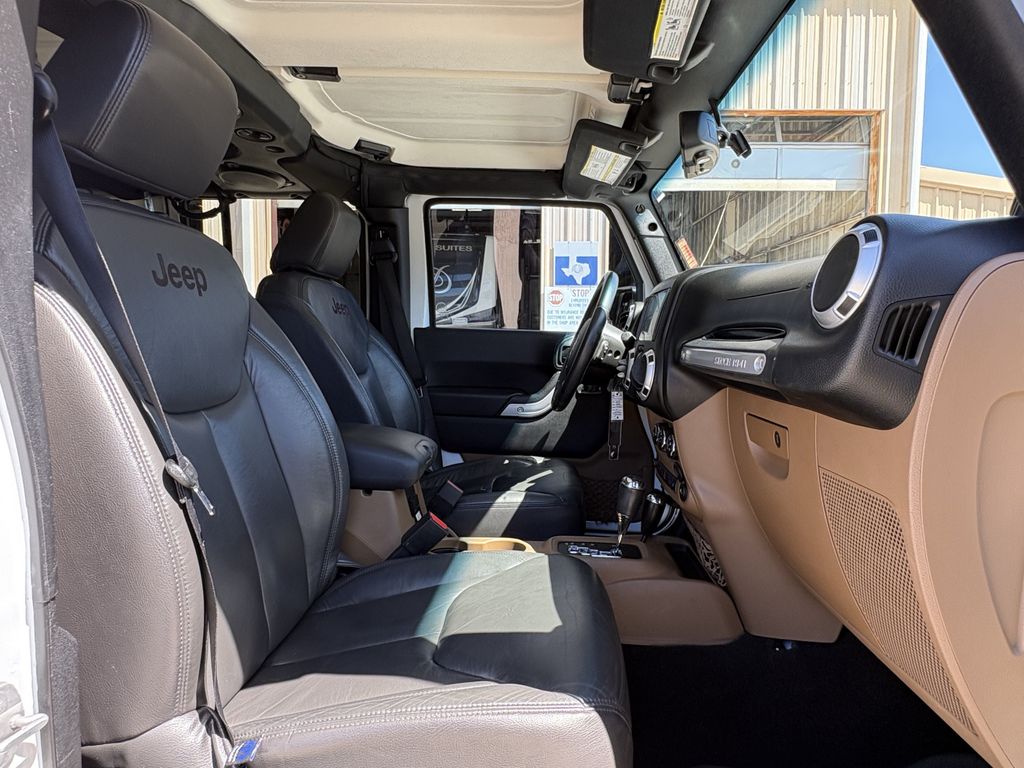 2014 Jeep Wrangler Unlimited Sahara White at Autostrade