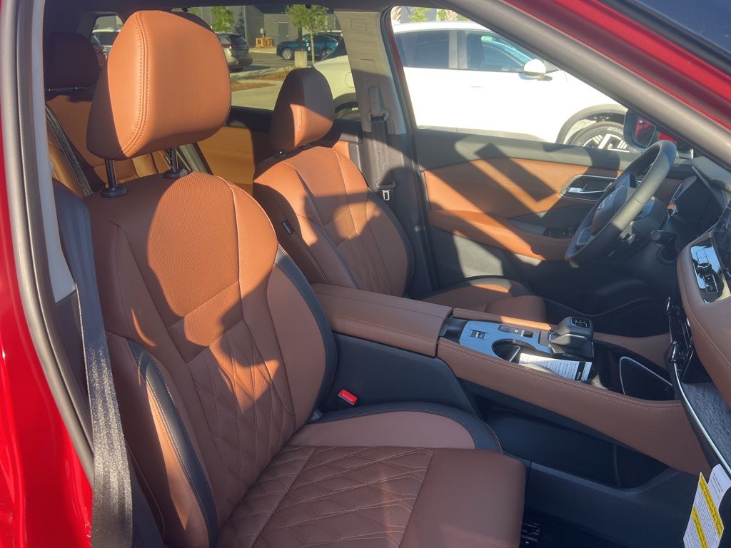 2025 Scarlet Ember Tintcoat Nissan Rogue Platinum FWD SUV