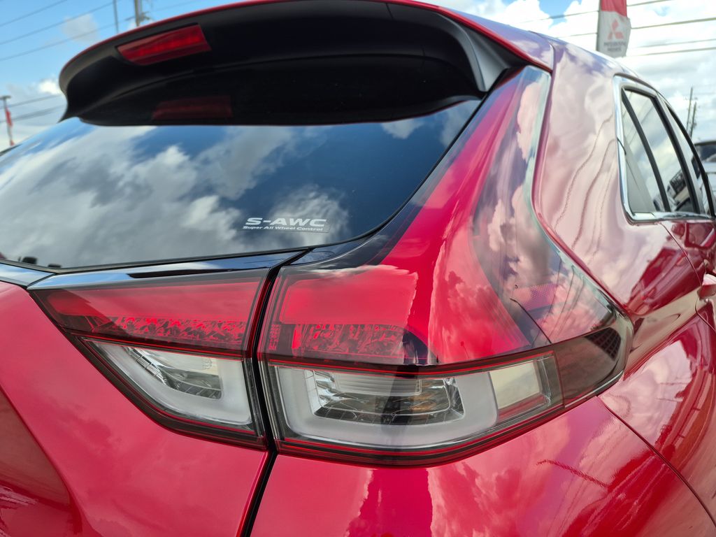 2025 Mitsubishi Eclipse Cross LE Red at DeMontrond Gulf Freeway