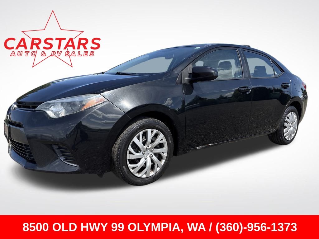 2016 Black Sand Pearl Toyota Corolla LE Sedan