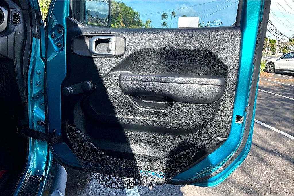 Used 2020 Teal Jeep Unlimited Sport image 19