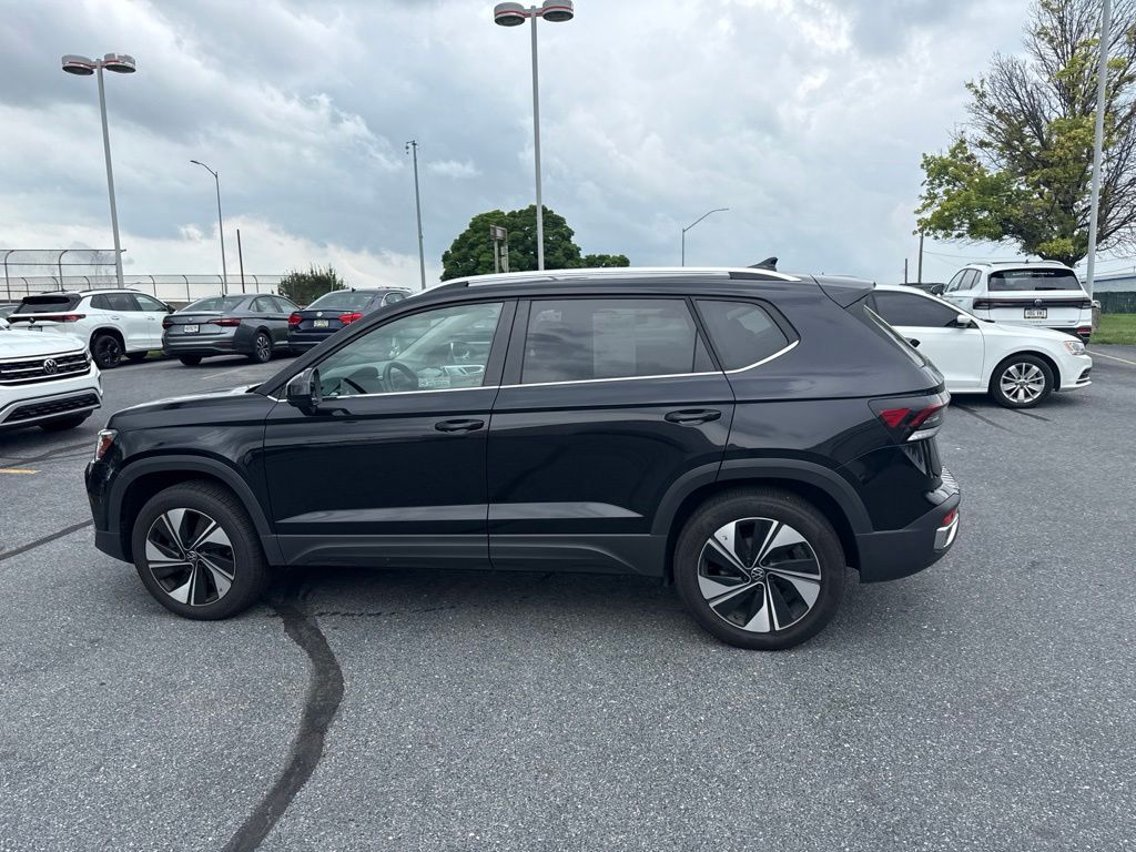 2025 Volkswagen Taos 1.5T SE Black at Sutliff Volkswagen