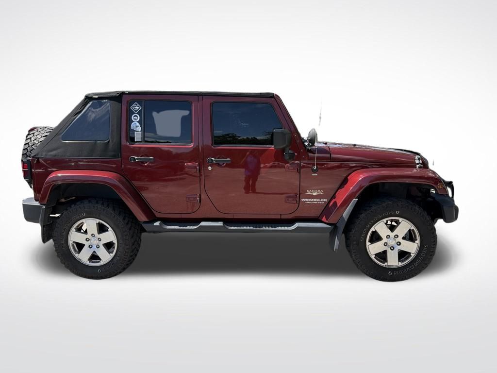 Used 2008 Red Jeep Unlimited Sahara image 4
