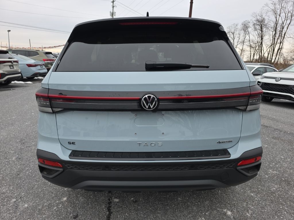 2026 Volkswagen Taos 1.5T SE Black Gray at Sutliff Volkswagen