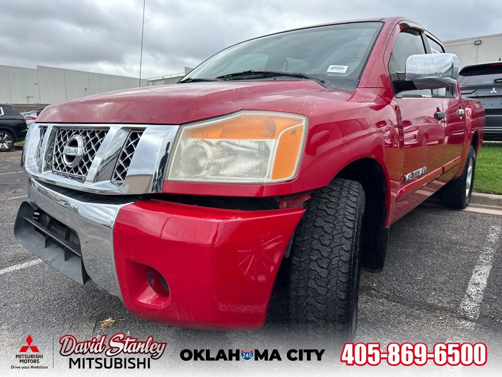 Red Alert Metallic 2010 Nissan Titan SE Crew Cab Pickup Truck 4X2 5-Speed Automatic
