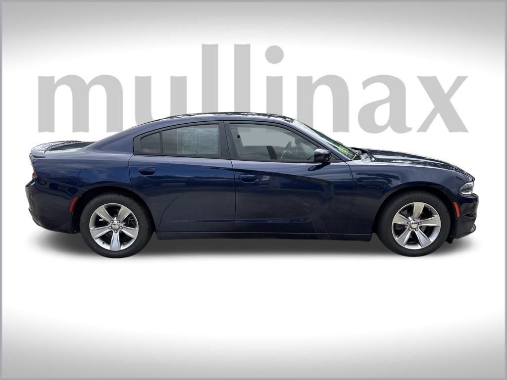 Used 2015 Dodge Charger SE with VIN 2C3CDXBG7FH874715 for sale in New Smyrna Beach, FL