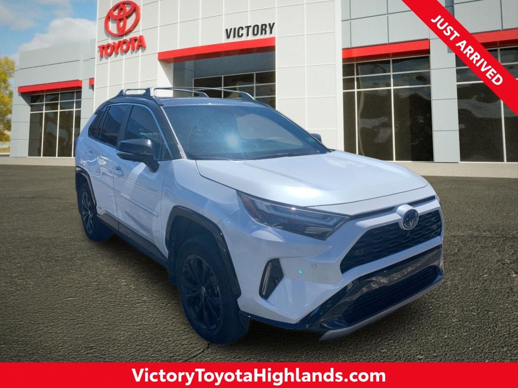 Wind Chill Pearl/Midnight Black Metallic 2024 Toyota RAV4 Hybrid SUV / Crossover All-Wheel Drive Continuously Variable Transmission