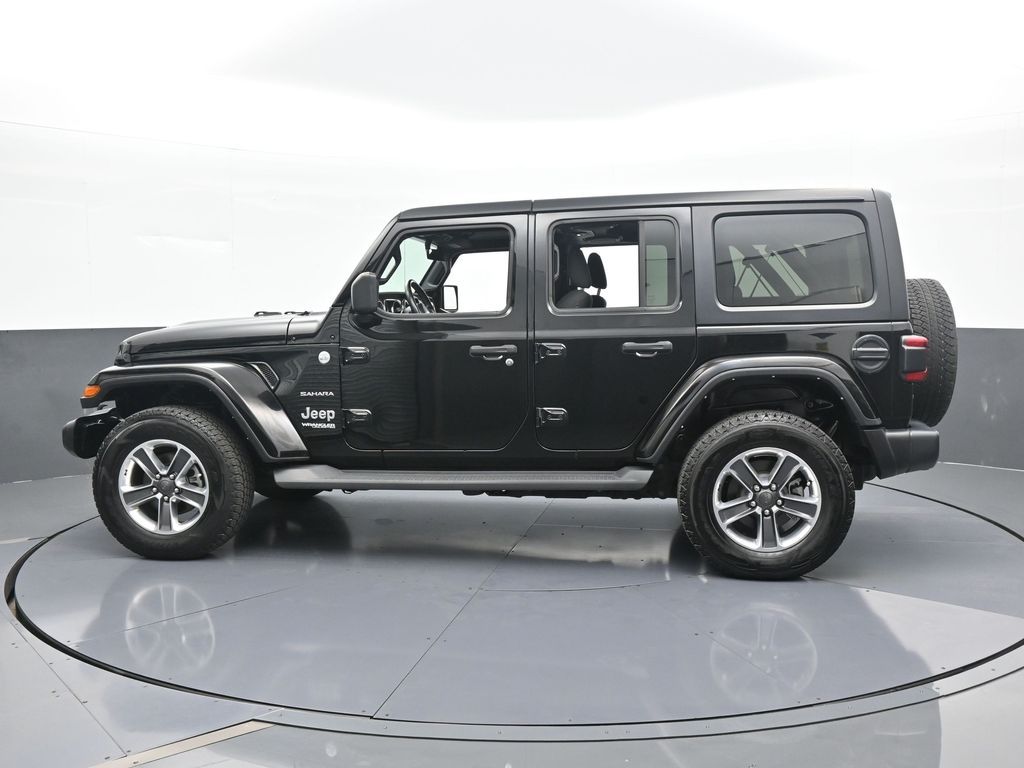 Used 2021 Jeep Wrangler Unlimited Sahara with VIN 1C4HJXEM9MW727421 for sale in Miami, FL
