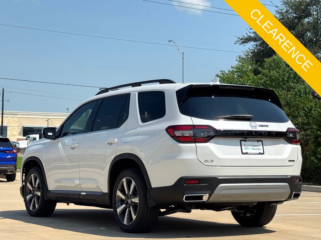2025 Honda Pilot Touring White at AutoSavvy Houston Northwest