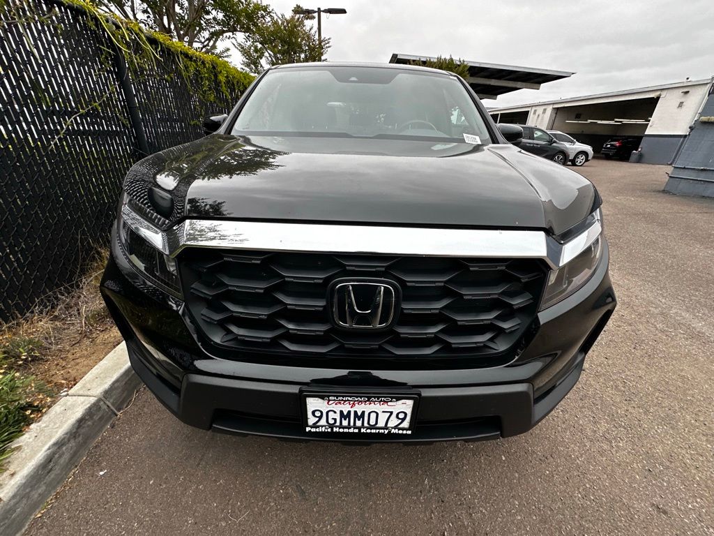 View vehicle photo 3