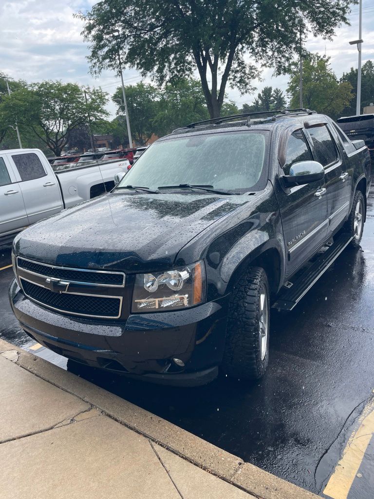 Black 2011 Chevrolet Avalanche Pickup Truck Four-Wheel Drive 6-Speed Automatic
