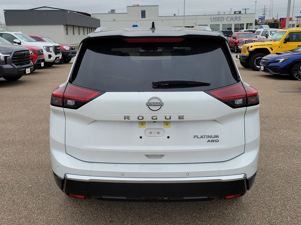 2026 Nissan Rogue Platinum White at Brown Honda