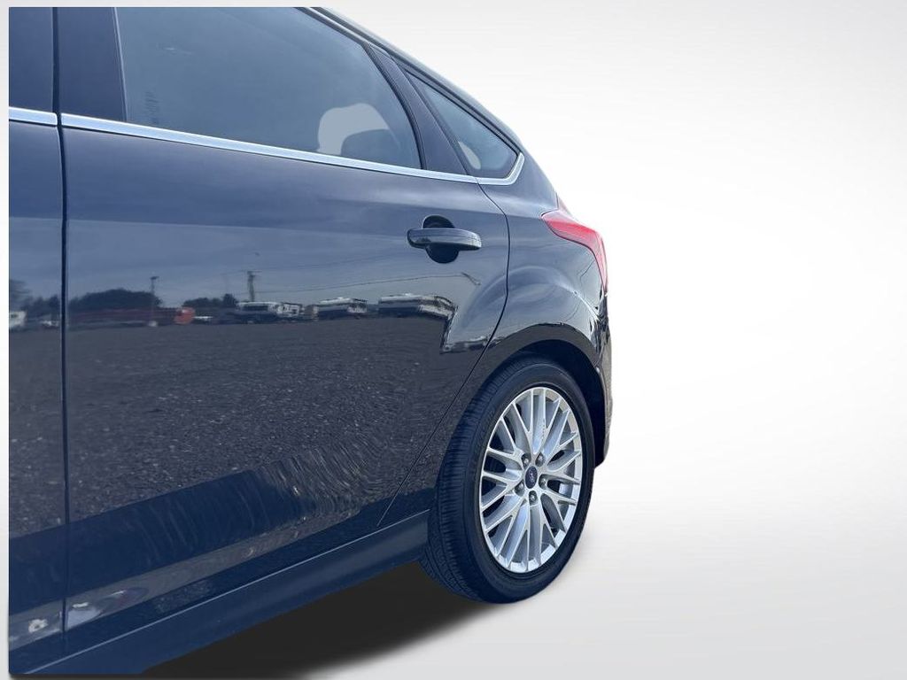 2014 Tuxedo Black Metallic Ford Focus Titanium FWD Hatchback