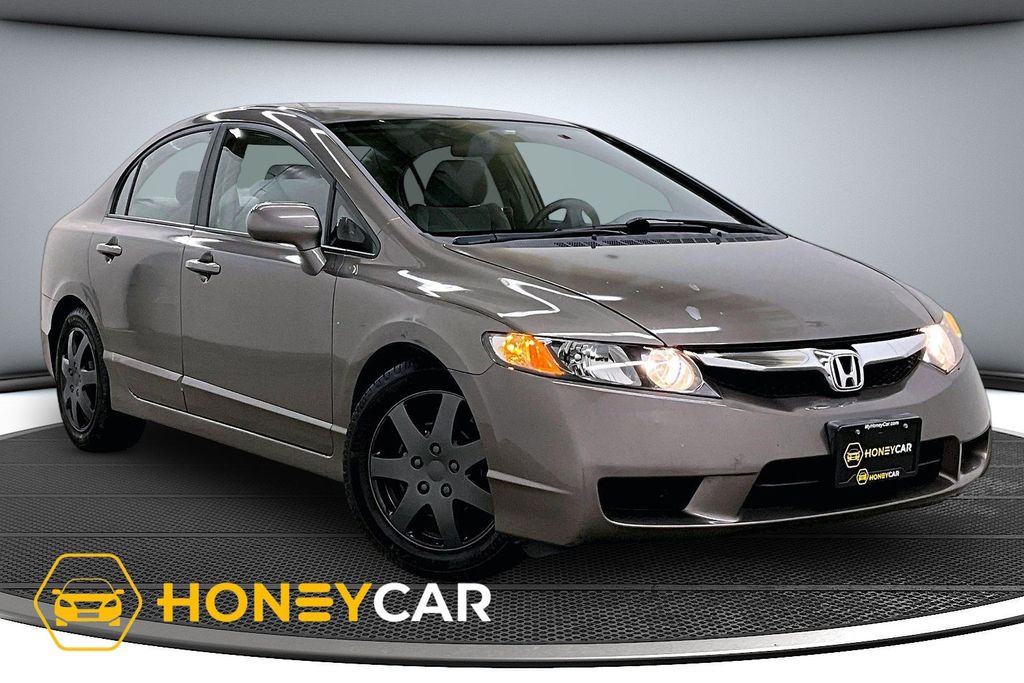 Urban Titanium Metallic 2010 Honda Civic LX Sedan Front-Wheel Drive 5-Speed Automatic